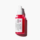 A vibrant red bottle of Kiehl's Hydro-Plumping Serum with a white pump dispenser. The product is centered against a plain white background, highlighting its bold packaging and label.