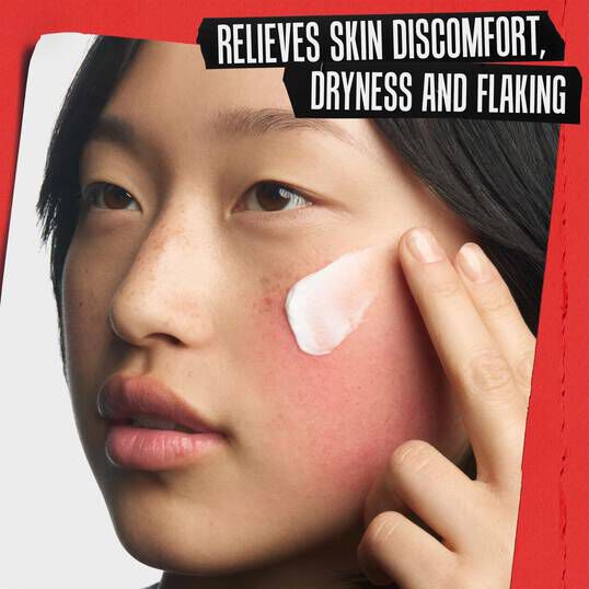 Person applying the Ultra Facial Meltdown Recovery Cream on cheek, highlighting benefits such as comforting and hydrating skin while reducing dryness and visible redness